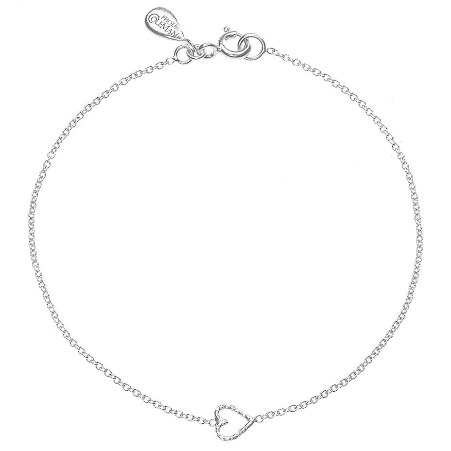 Love Me Tender Heart bracelet in silver, featuring an adorable tiny open heart.
