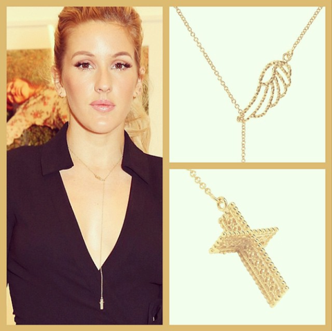 Ellie Goulding wearing the Angel Wing and Lace Cross necklace in gold.