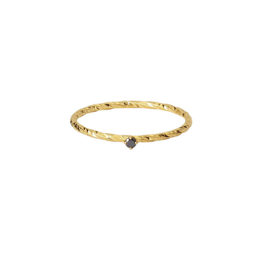 Raven Black Diamond ring in gold, fashioned from a claw set black diamond sitting upon our signature sparkling band.