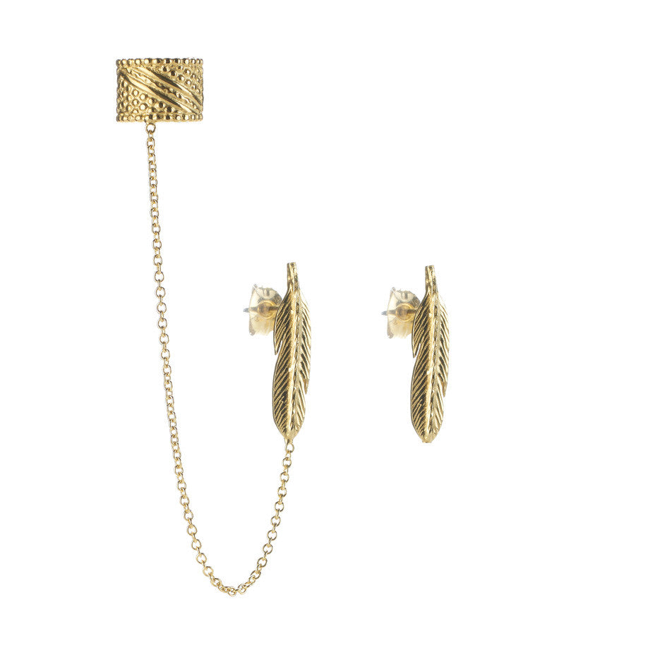 Warrior Ear Cuff and Feather Stud earrings in gold, featuring little feather studs and an ear cuff connect by a delicate chain.