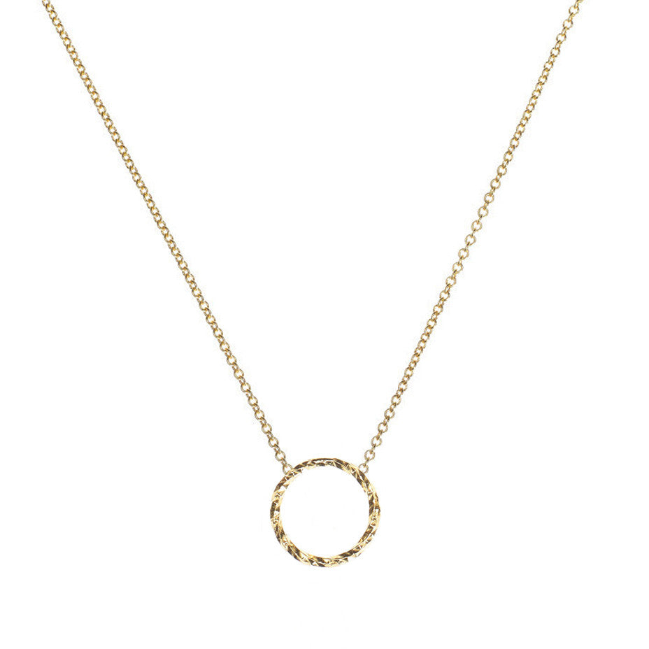 Protective Circle necklace in gold.