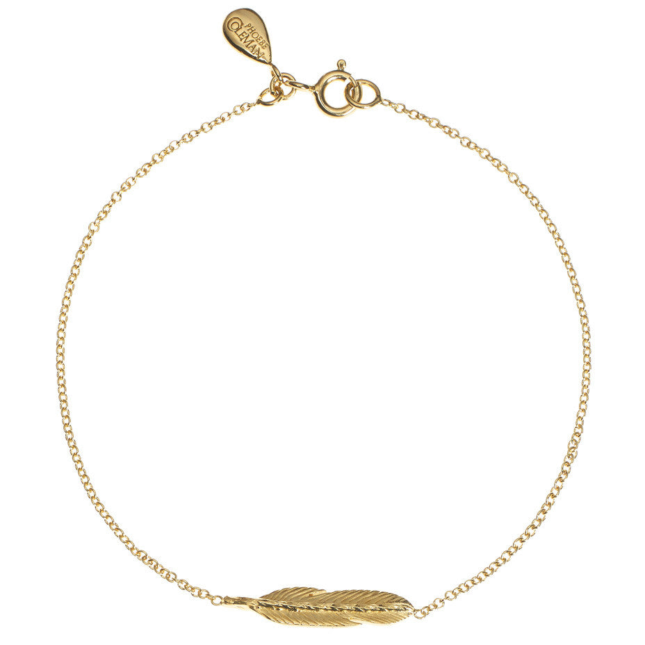 Take Flight Feather bracelet in gold.