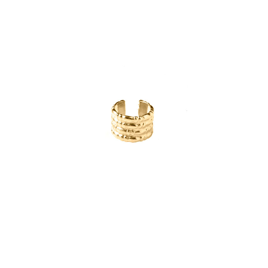 Equine Ear Cuff in gold, featuring four bands of our equine wire seamlessly joined together.