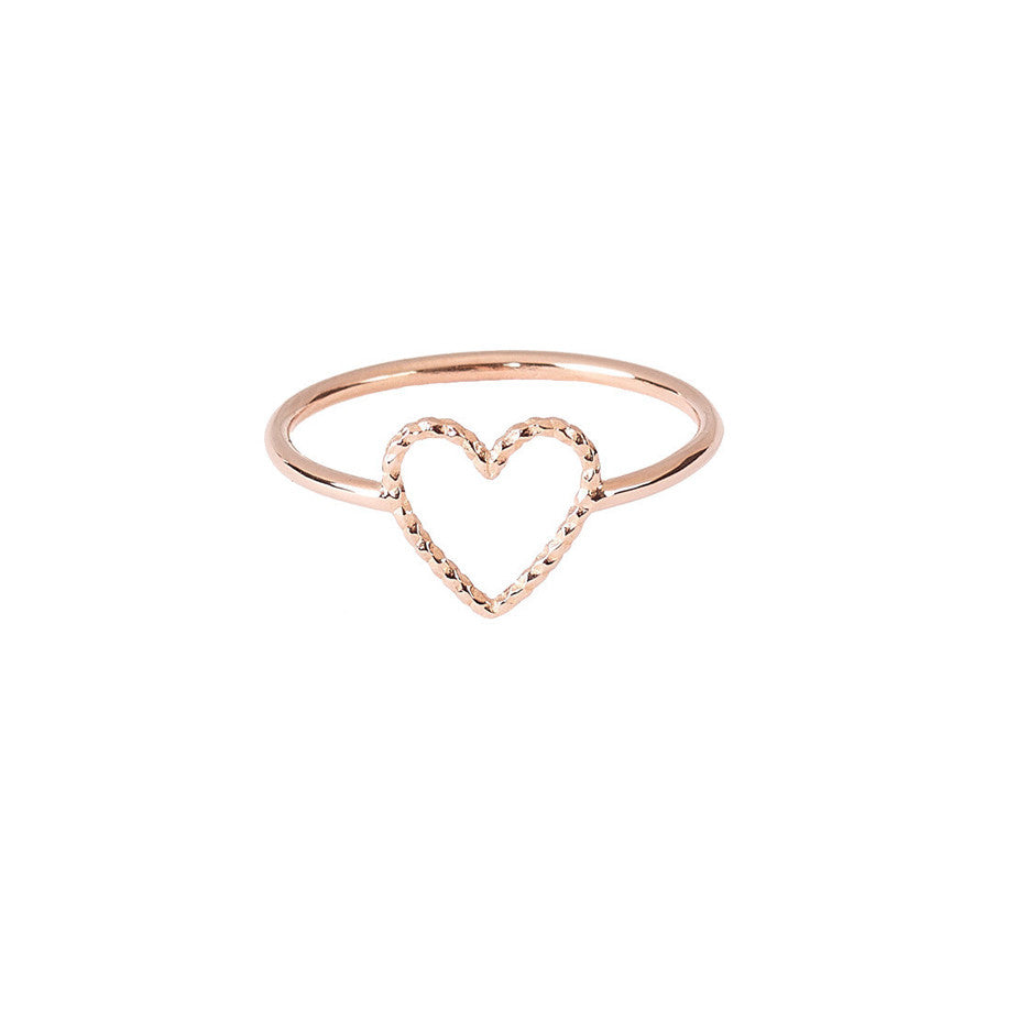 Love Me Tender ring in rose gold with textured cut out heart sits prettily on your finger.
