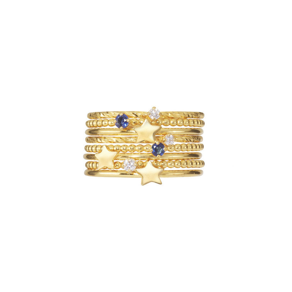 Party Girl Stacking set in gold, featuring royal blue sapphires, baby white diamonds and gold stars.