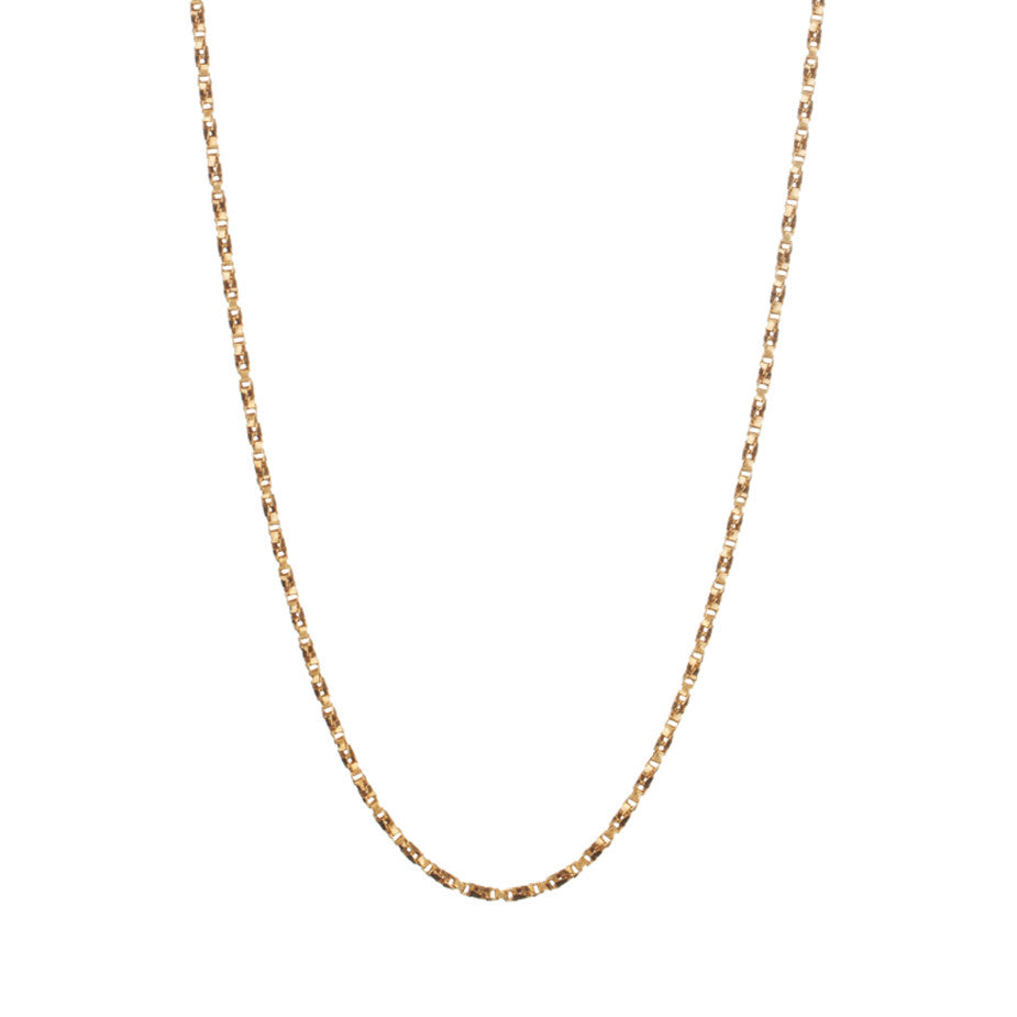 Regal Twist Chain in gold, made from twisted square links that give it a slinky feeling.