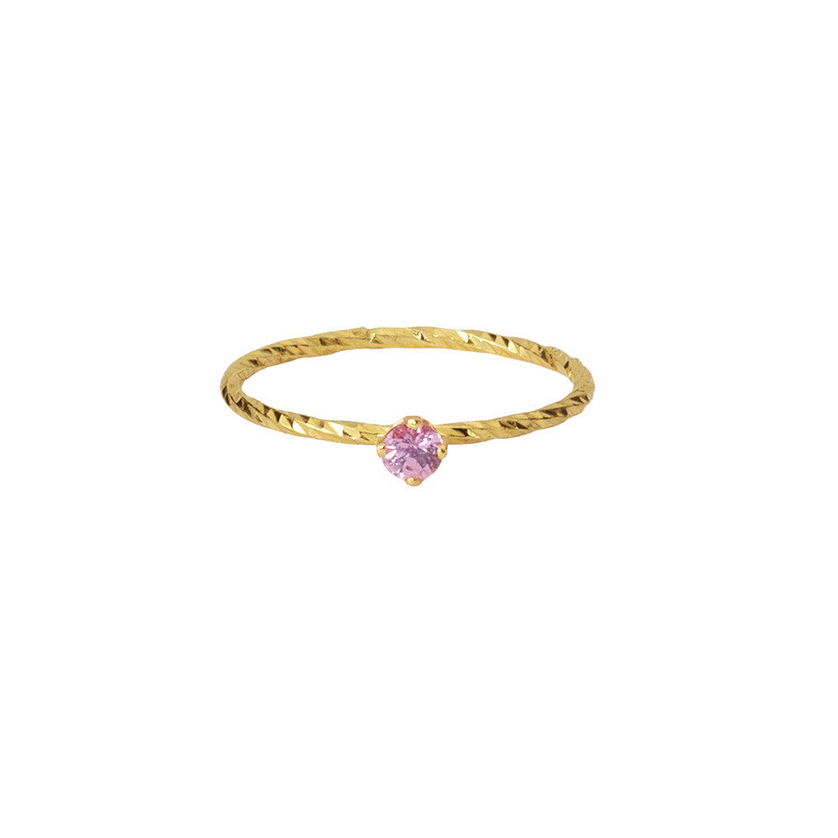 Pretty In Pink Sapphire ring in gold, made from a claw-set pink sapphire on our signature sparkling band.