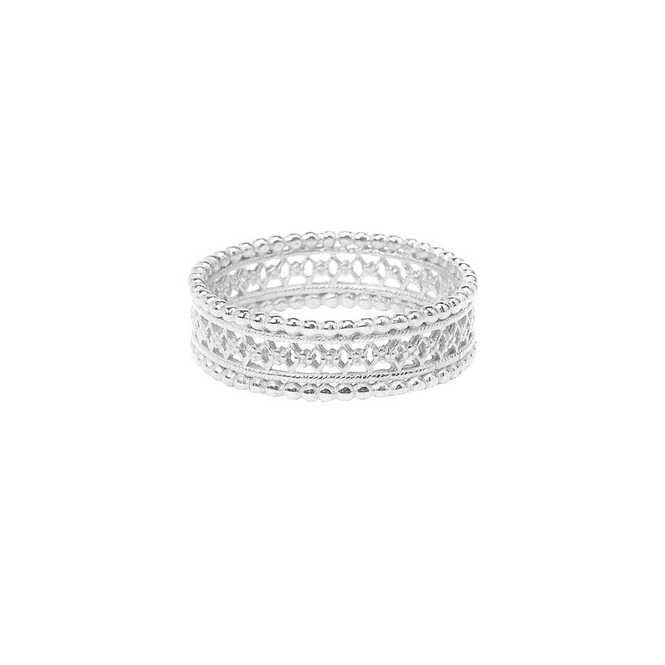 The Ancient ring in silver, featuring an intricate lace design.