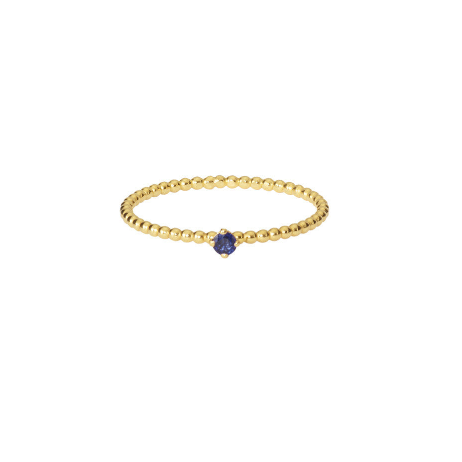 Royal Blue Sapphire ring in gold, featuring a claw set sapphire on our signature beaded band.
