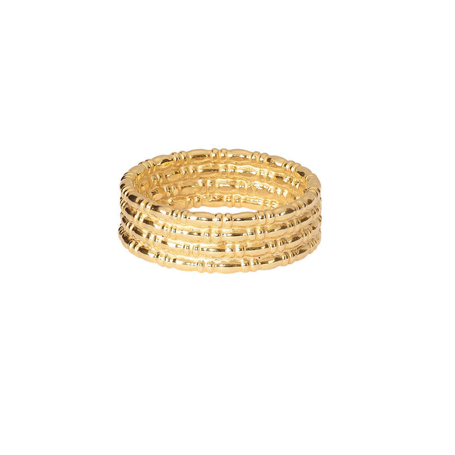 The Equine Wide Band ring in gold. A beautiful ring that echoes the bridle of horses.