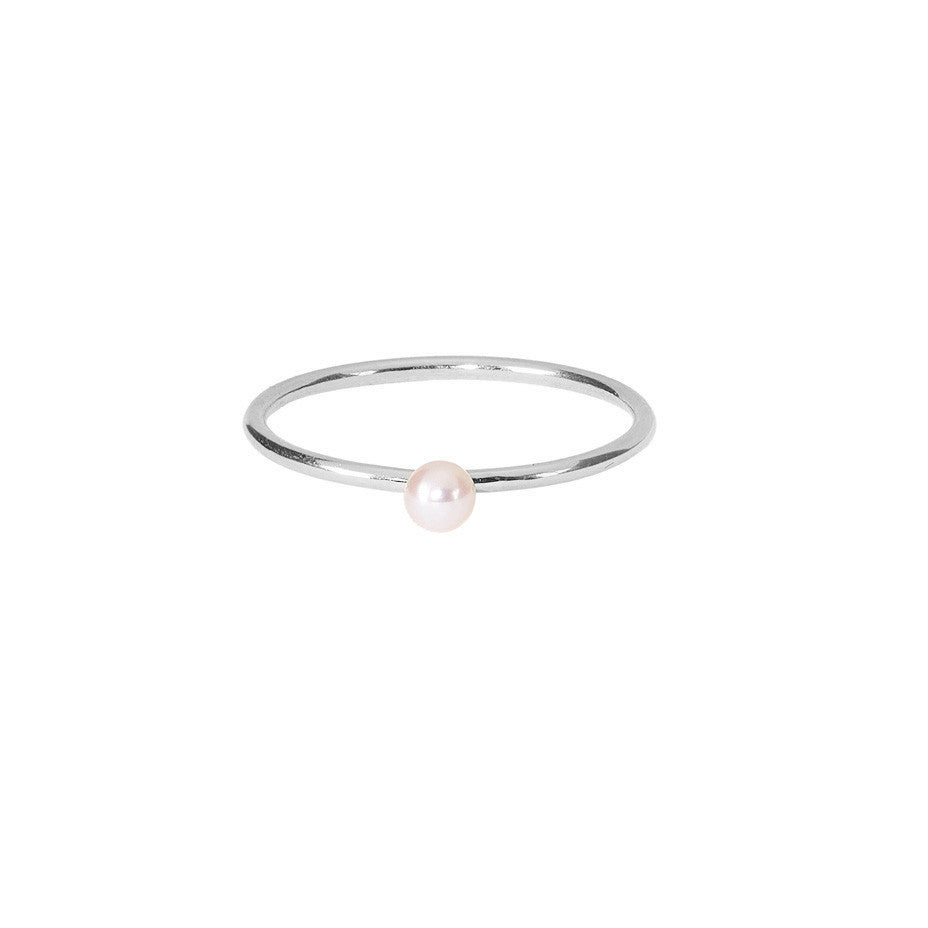 Lunar White Mini Pearl ring in silver, featuring a mini freshwater pearl on a simple silver band.