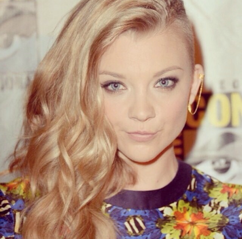 Natalie Dormer wearing the Warrior Ear Cuff and Feather Stud earrings in gold.