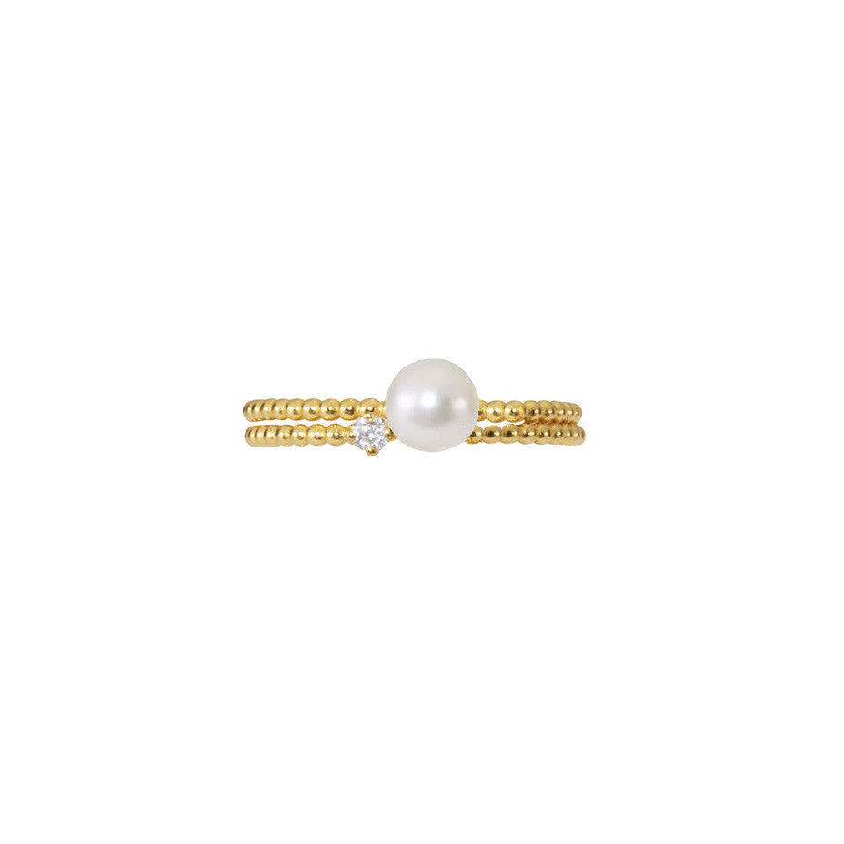 Lily White Diamond and Lunar White Medium Pearl Stacking duo in gold.