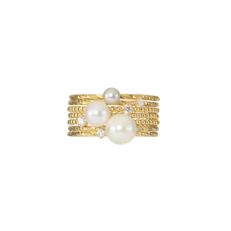 The Dreamer Stacking set in gold, featuring a combination of Lunar White, Lily White and London Mist pearls together with a scattering of diamonds.