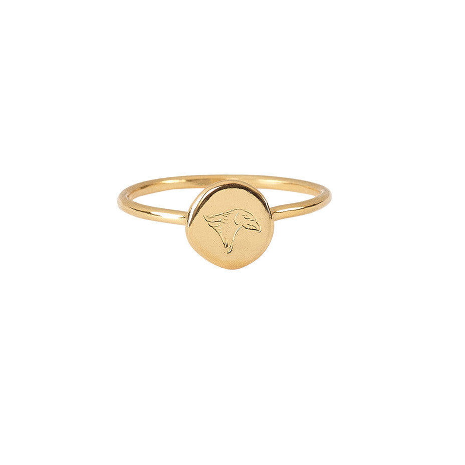 Time Eagle Stacking ring in gold, made from a finely engraved head of an eagle decorating a smooth gold coin.