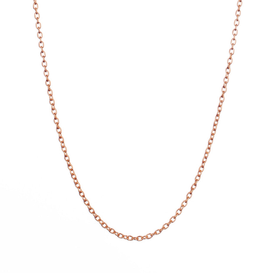 The Eternal Rolo Chain in rose gold, made from a weightier chain with oval links.