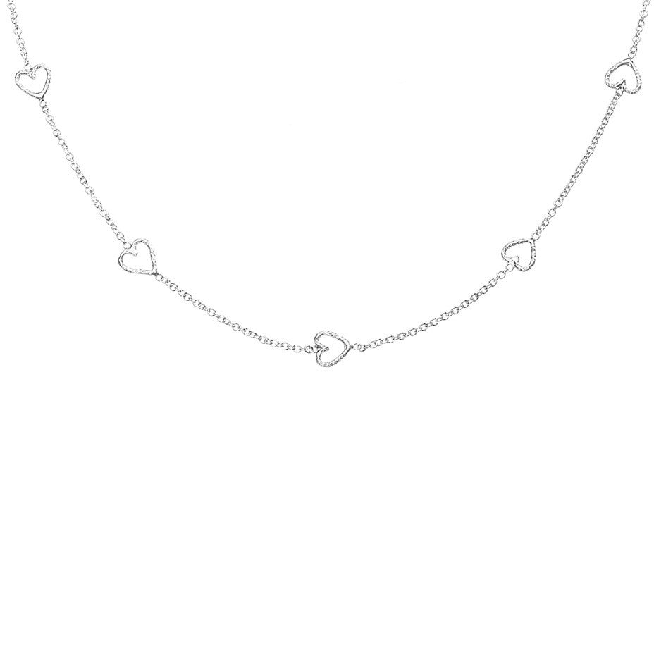 The Loop Of Love necklace in silver, featuring 5 tiny open hearts.