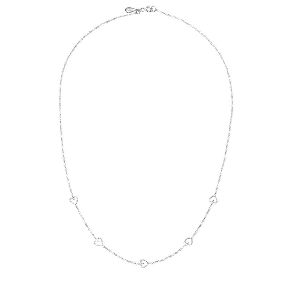 The Loop Of Love necklace in silver, featuring 5 tiny open hearts. Full view.