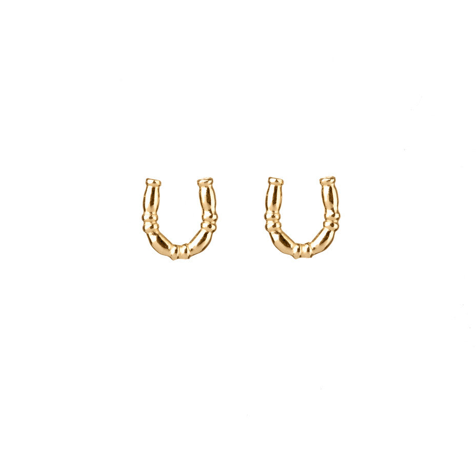Lucky Horseshoe Stud earrings in gold, featuring little horseshoes made from our equine bridle wire.
