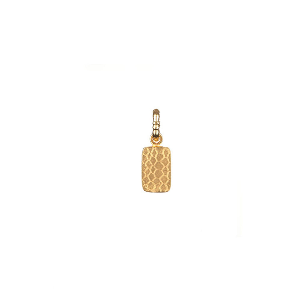 Mini Nugget charm in gold, featuring a bite size tablet of gold with a snake skin scale print engraved into the surface.