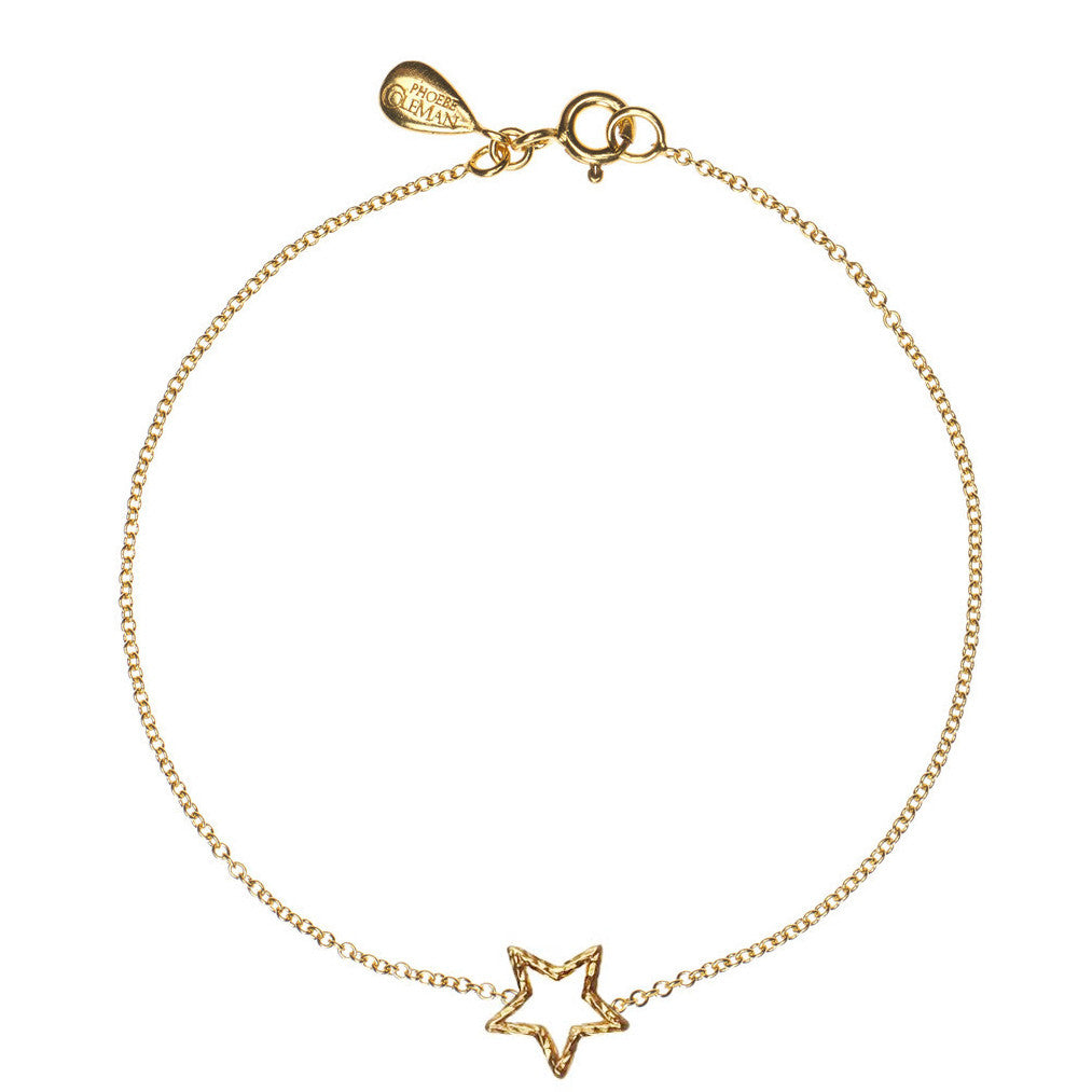 Estella Star bracelet in gold, featuring a shining star made from our signature sparkling wire.