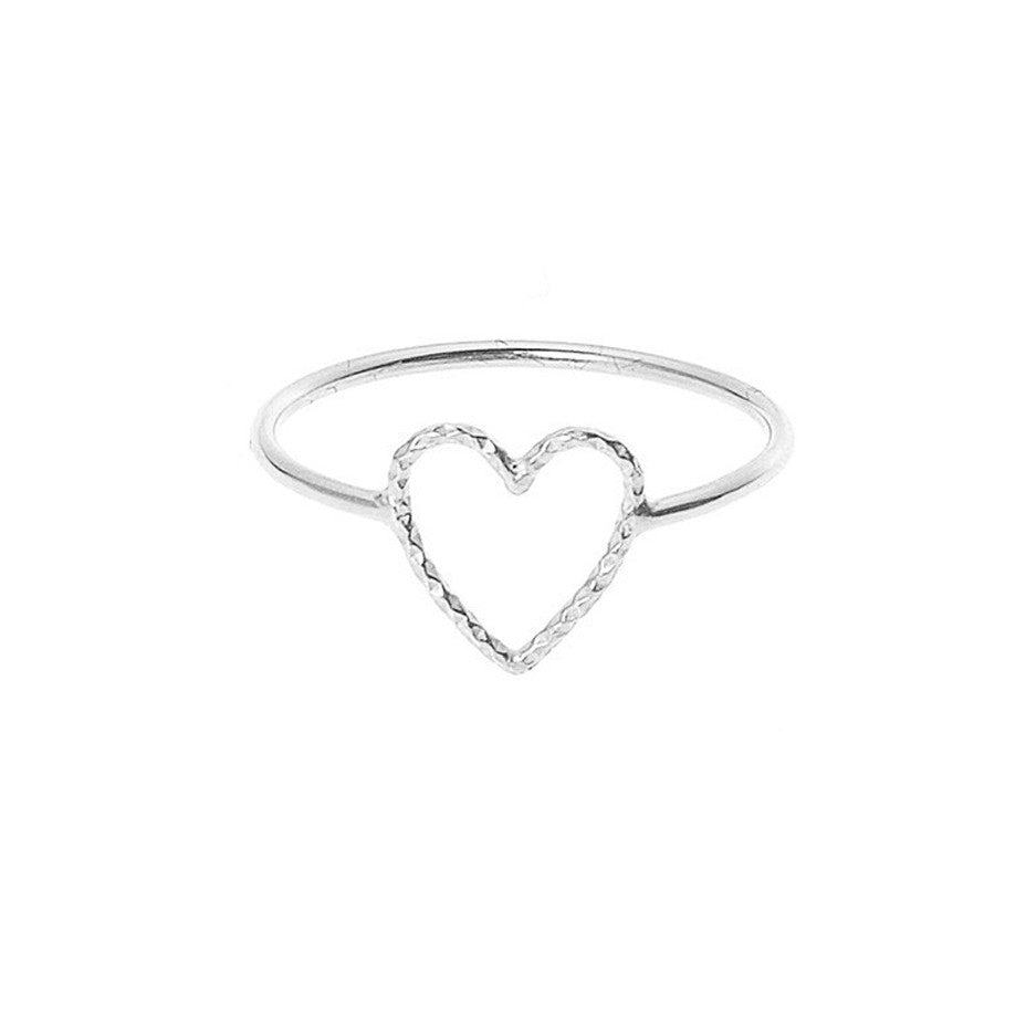 Love Me Tender ring in silver with diamond cut open heart.