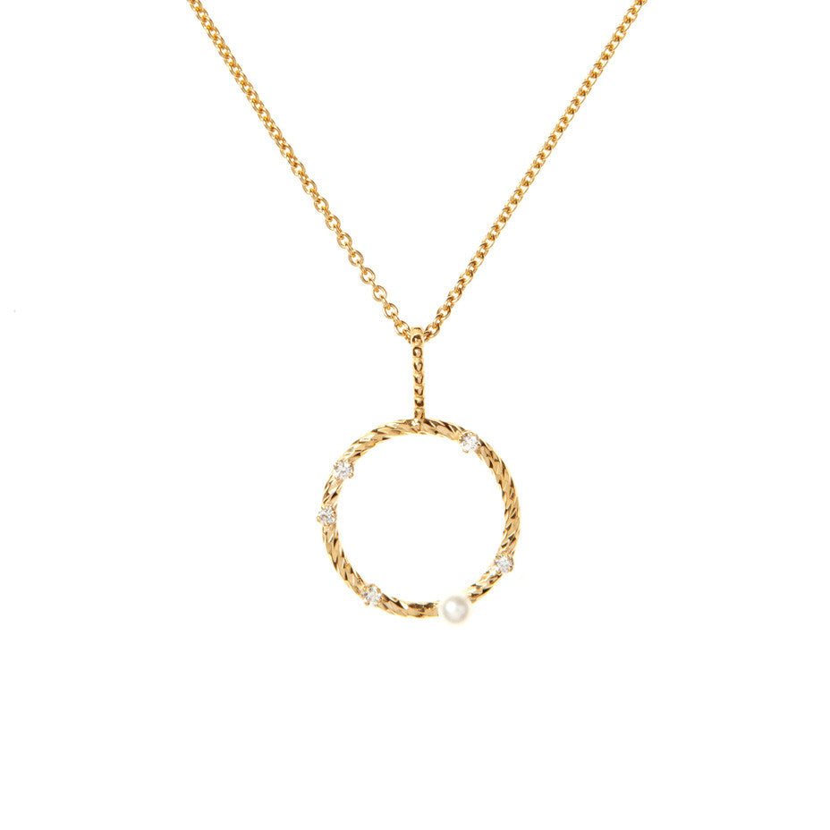 Star Gazer Diamond and White Pearl necklace in gold, featuring a beaded wire bale with sparkling diamond cut circle adorned with one Lunar White mini pearl and 5 baby white diamonds.