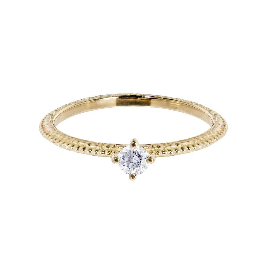 White diamond solitaire Tender Love engagement ring in 18 carat yellow gold, featuring a delicate beaded band.