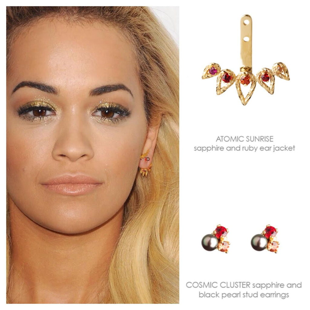 Rita Ora wears the Atomic Sunrise Ear Jacket paired with the Cosmic Cluster Stud earrings in gold.