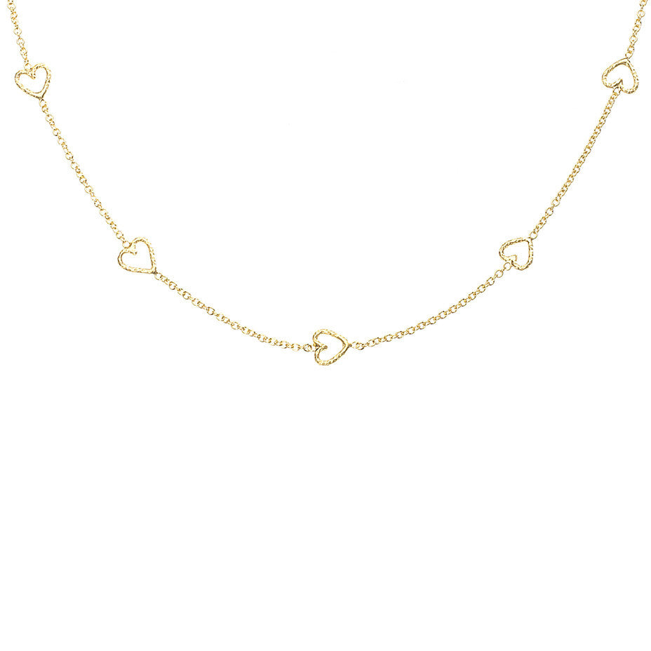 The Loop Of Love necklace in gold, featuring 5 tiny open hearts.